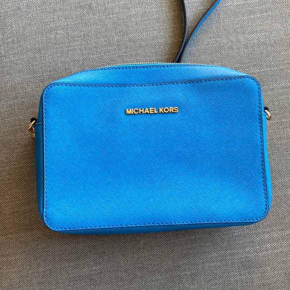 Blue Michael Kors cross body bag. Matching wallet a available. - Picture 1 of 5